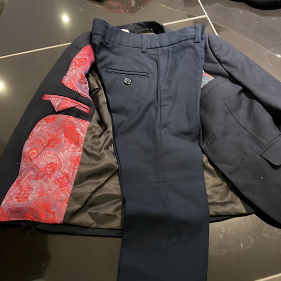 two piece suit purchased for family wedding never worn. Added the pocket square - Picture 5 of 7